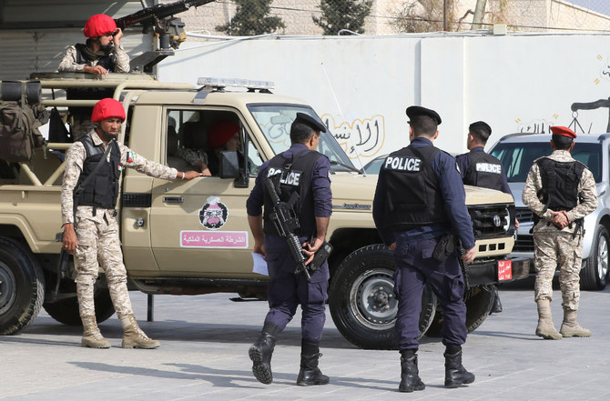Jordanian security police stand guard outside a military court in the Jordanian capital of Amman. (AFP file photo)