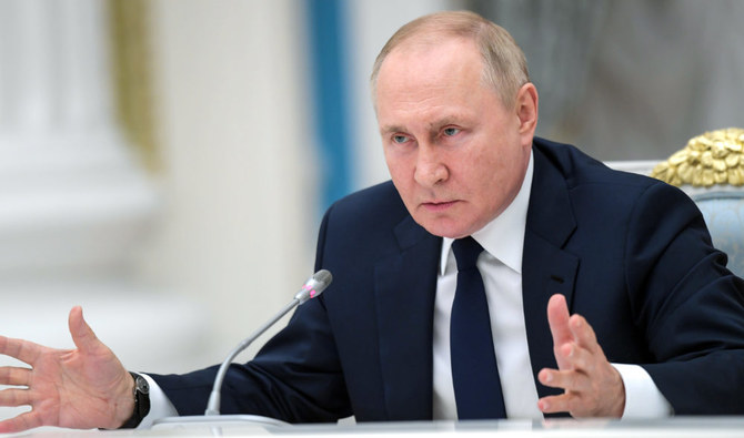 Russian President Vladimir Putin gestures as he speaks to members of the State Duma in the Kremlin in Moscow, Russia. (AP)