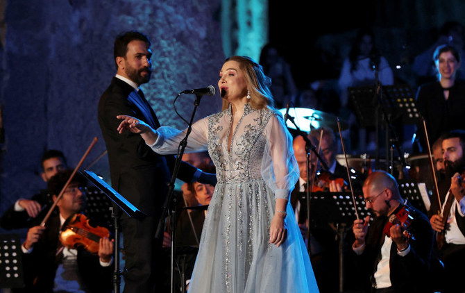 Lebanese singer Soumaya Baalbaki and conductor Lubnan Baalbaki perform during the opening of Baalbeck International Festival.
