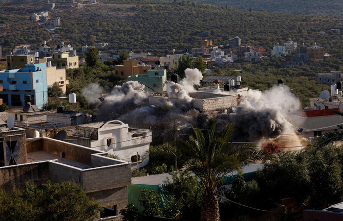 Israel demolishes homes of suspected Palestinian attackers