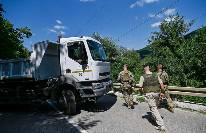 NATO peacekeepers oversee removal of roadblocks in Kosovo
