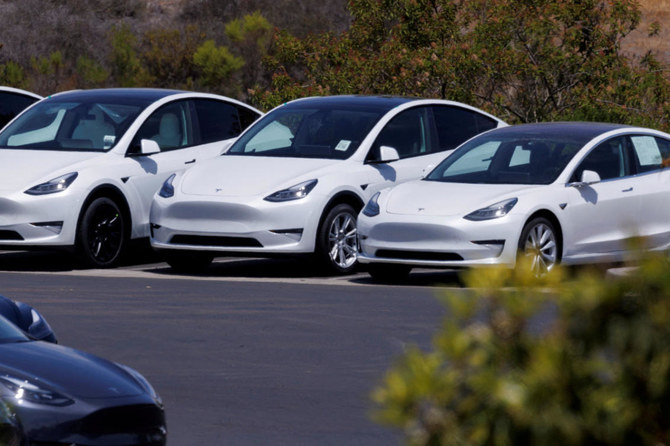 Tesla investors approve stock split; Musk sets goal of 20m cars per year