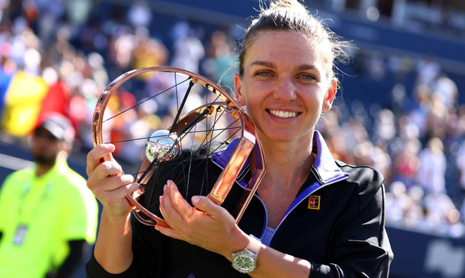 Halep holds off Haddad Maia to win third WTA Canadian crown