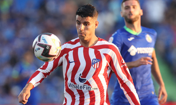 Morata scores twice as Atlético debuts with win at Getafe