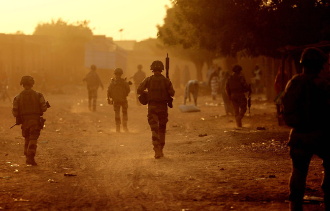 In this file photo taken on December 04, 2021 French soldiers patrol the streets of Gao. (AFP)