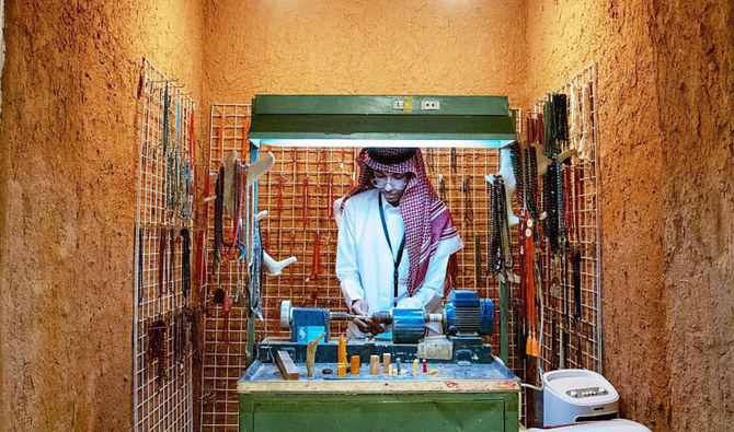 Saudi artisan showcases traditional Hail beadwork art