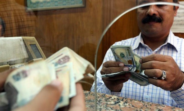 Egypt expected to devalue currency to counter soaring inflation: Moody’s