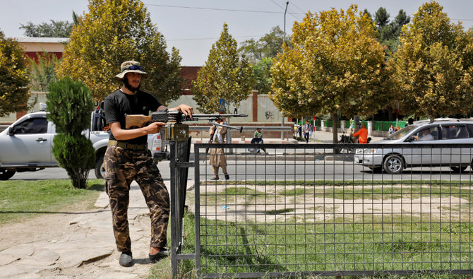 A Taliban fighter stands guard after a blast in front of the Russian embassy in Kabul, Afghanistan, September 5, 2022. (REUTERS)