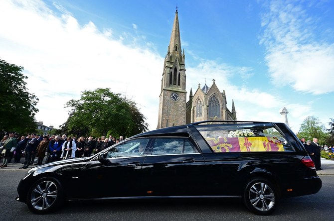 Queen Elizabeth II’s coffin makes journey through Scotland