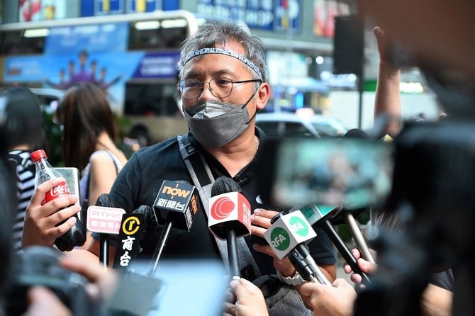 Head of Hong Kong journalists group charged with obstructing police