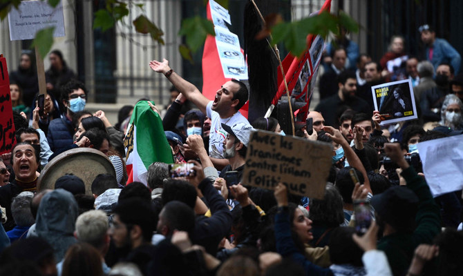 Police clash with Iran protesters in London and Paris