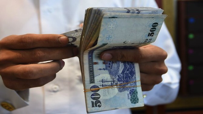 Saudi police bust four-member gang dealing in counterfeit money