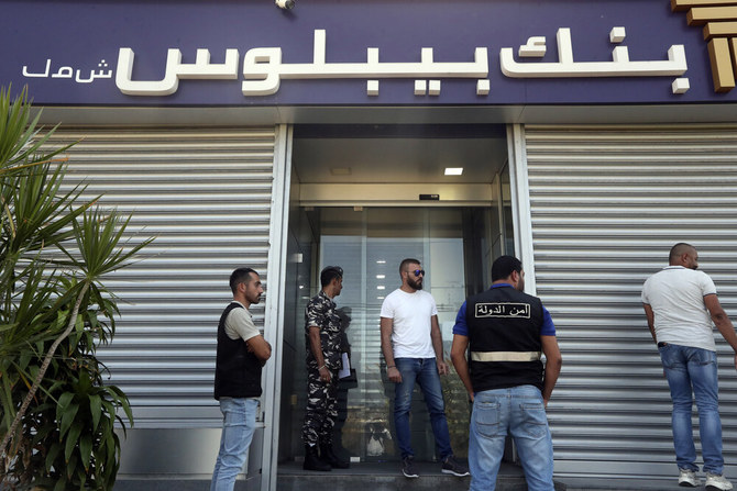 Savers storm Lebanese banks to demand their money