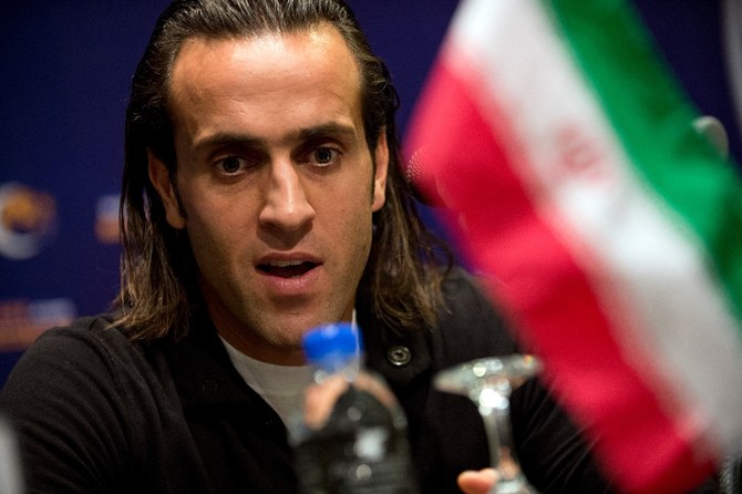 Iran charges former Bayern Munich player Ali Karimi over support for protests