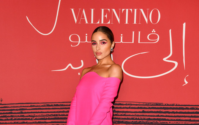 Olivia Culpo, Amina Muaddi attend opening of Valentino’s Doha exhibition