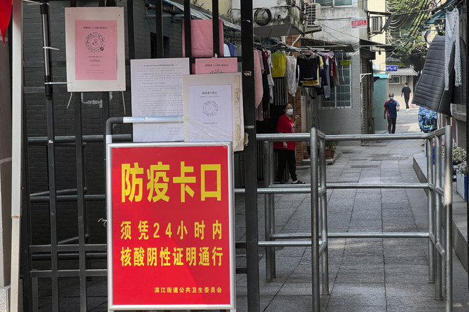 China tightens restrictions as rise in COVID-19 cases reported