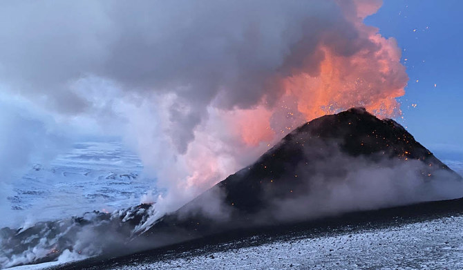 Flames and smoke billowing during the Klyuchevskaya volcano's eruption on the Kamchatka Peninsula in Russia, on March 8, 2021. 