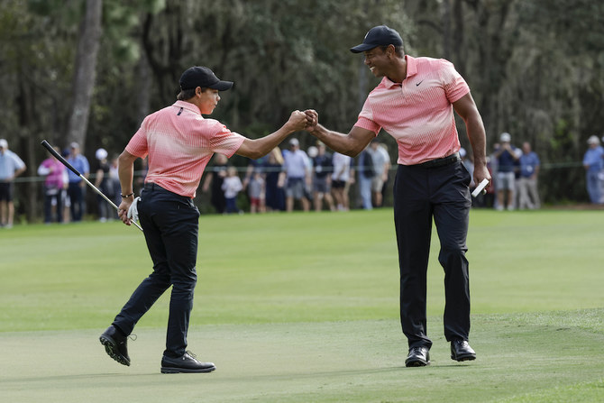 Tiger Woods and son hobble to a 59 and are 2 back of Team Thomas