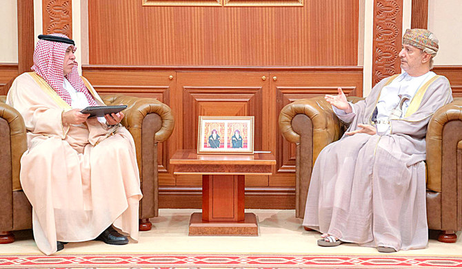 Majid Al-Qasabi hold talks with Qais bin Mohammed Al-Yousef in Muscat. (Supplied)