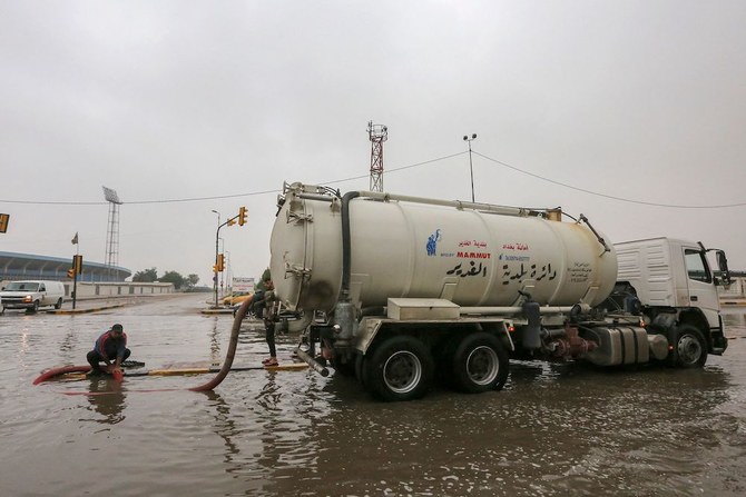 Baghdad clearing flooded streets after heavy storms hit Iraq
