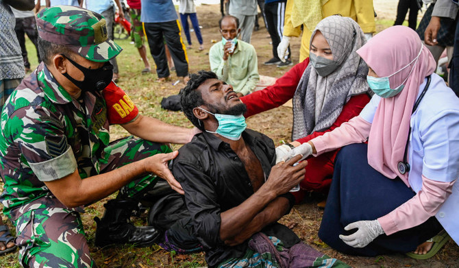 Dozens of Rohingya refugees come ashore in north Indonesia