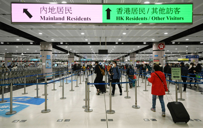 China ends quarantine for overseas travelers