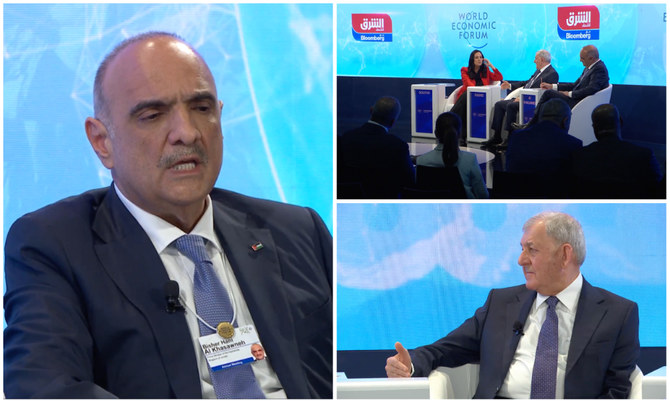 Iraq’s President Abdulatif Rashid and Jordan’s Prime Minister Bisher Hani Al-Khasawneh (L) speaking at the World Economic Forum