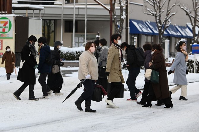 One dead as heavy snow and record cold hit Japan