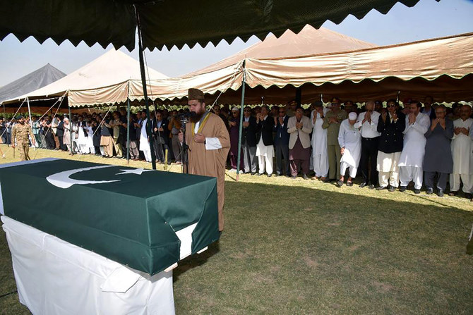 People attend the funeral prayer of Pakistan’s former President Pervez Musharraf, in Karachi. (AP)