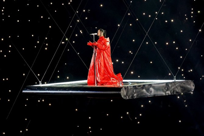  Rihanna dons custom Alaia coat for Super Bowl performance, reveals pregnancy 
