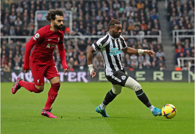Liverpool beat 10-man Newcastle to boost top-4 hopes