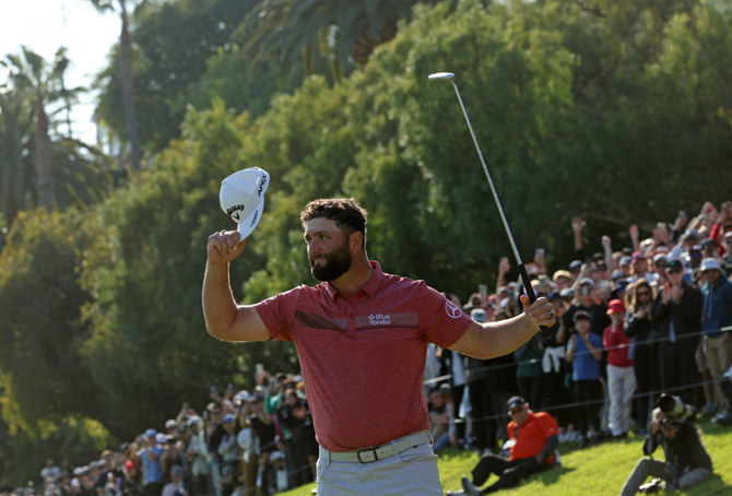 Rahm holds on to win at Riviera and return to No. 1 in world