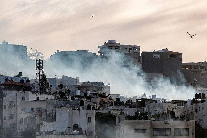 Smoke plumes billow during an Israeli army raid in the Jenin camp for Palestinian refugees in the occupied West Bank.