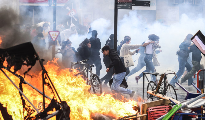 Violence flares as French protesters vent fury at Macron reform