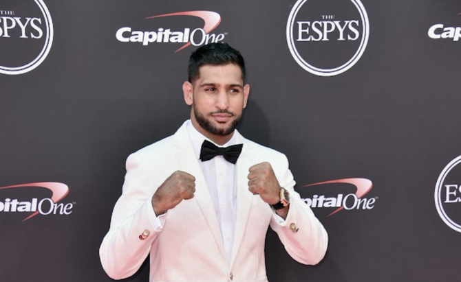 Former world boxing champion Amir Khan has said he feared his children would grow up fatherless after he was robbed at gunpoint.