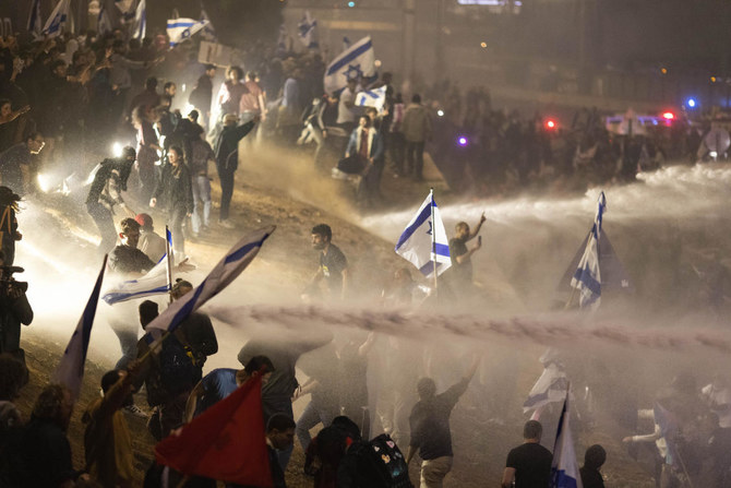 Israeli president urges halt to judicial overhaul after protests