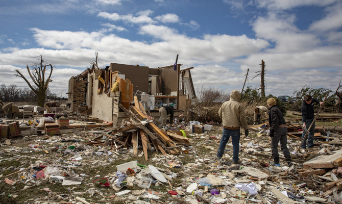 At least 21 dead after tornadoes rake US Midwest, South