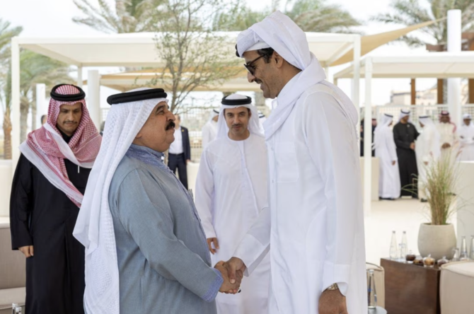 King of Bahrain Hamad bin Isa Al-Khalifa greets Emir of Qatar Sheikh Tamim bin Hamad Al-Thani at St Regis Saadiyat, Abu Dhabi.