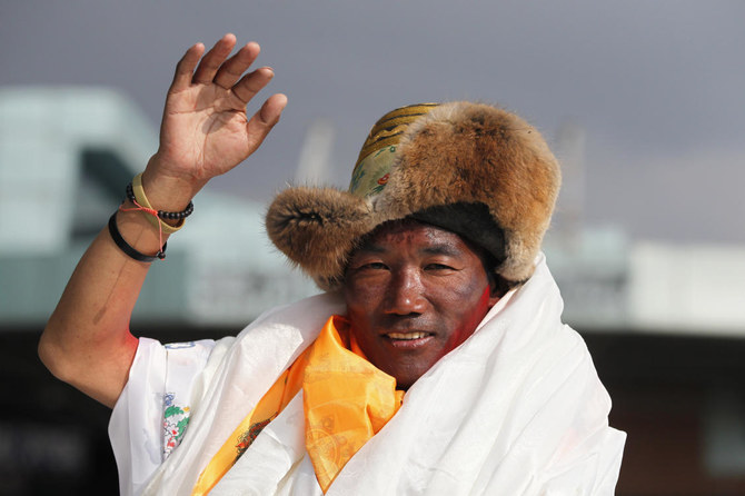 Nepali sherpa scales Everest for record 28th time