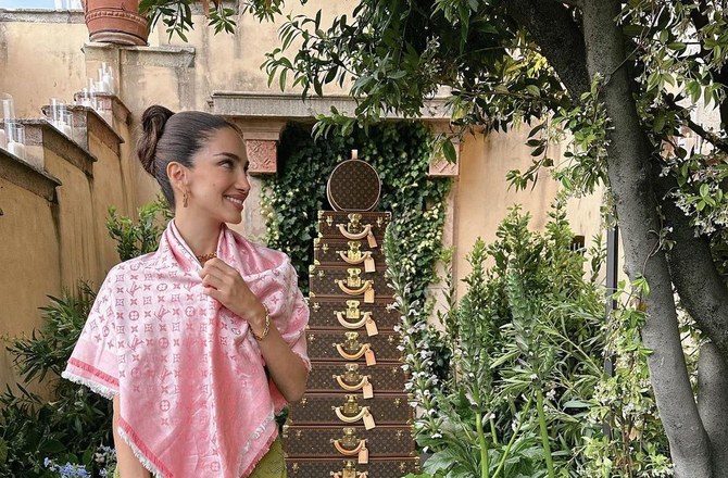 Lebanese Australian model Jessica Kahawaty attends Louis Vuitton’s cruise show in Italy