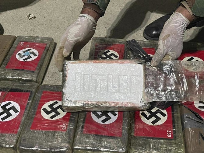 Police in northern Peru port seize cocaine packets with Nazi flag printed on the outside