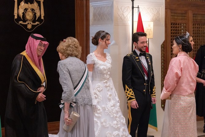 Princess Rajwa Al-Hussein shows off surprise second wedding gown at state reception