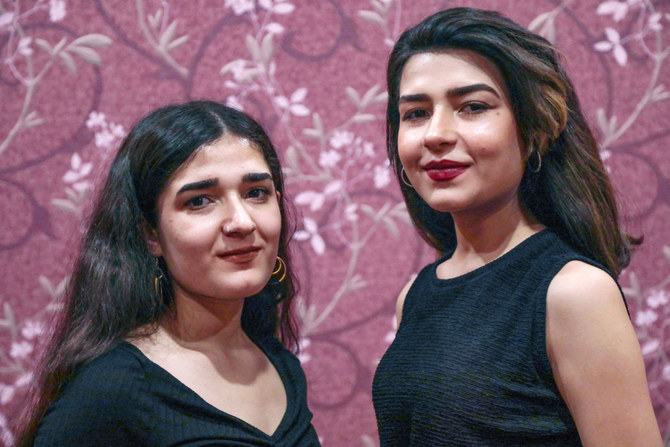 After Daesh and bombs, refugee sisters sing of Kurdish sorrow
