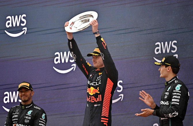 Motor racing-Verstappen wins in Spain to continue Red Bull sweep