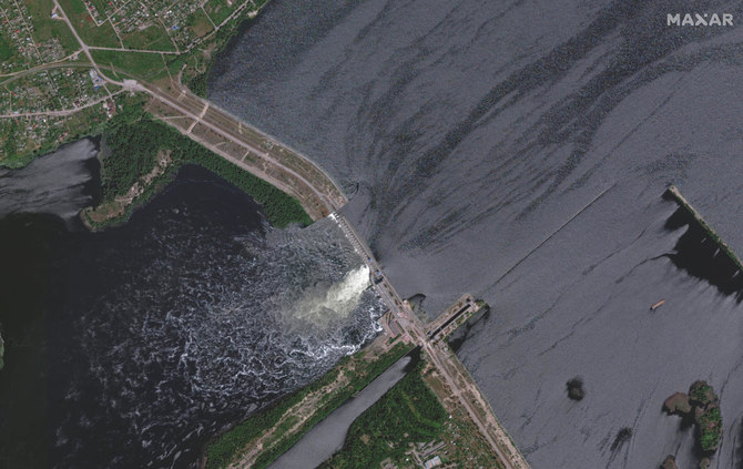 Kakhovka dam in southern Ukraine is blown, unleashing flood of water