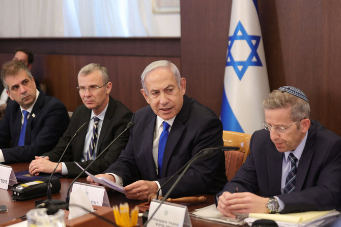 Israeli Prime Minister Benjamin Netanyahu (2-R) attends the weekly cabinet meeting in his office in Jerusalem, on June 25, 2023.