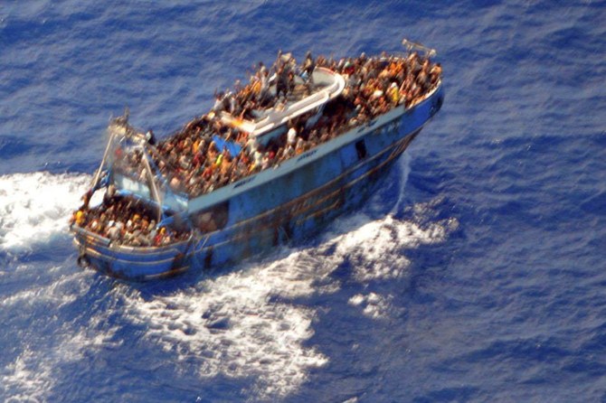 Greek coast guard boat was towing migrant vessel when it sank, eyewitnesses claim