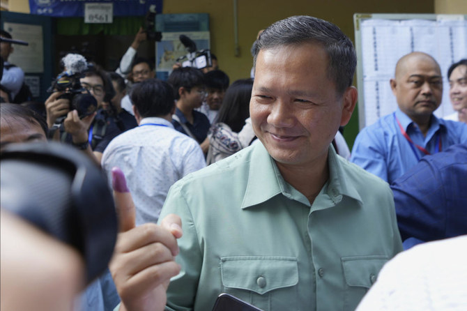 Cambodia holds lopsided election before historic transfer of power