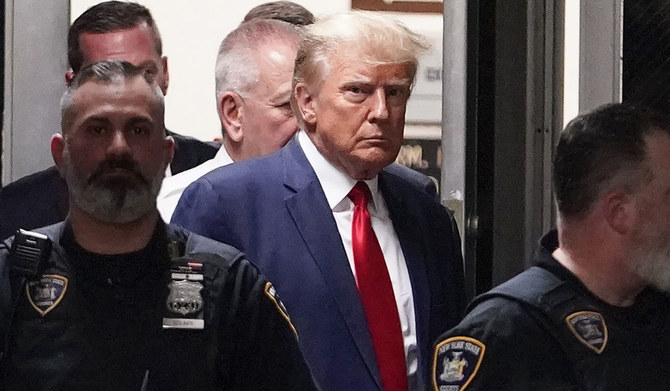 Former President Donald Trump is escorted to a courtroom, April 4, 2023, in New York. (AP)
