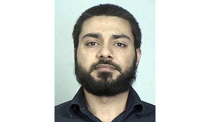 This booking photo provided by the Sherburne County, Minn., Sheriff's Office shows Muhammad Masood. (AP)
